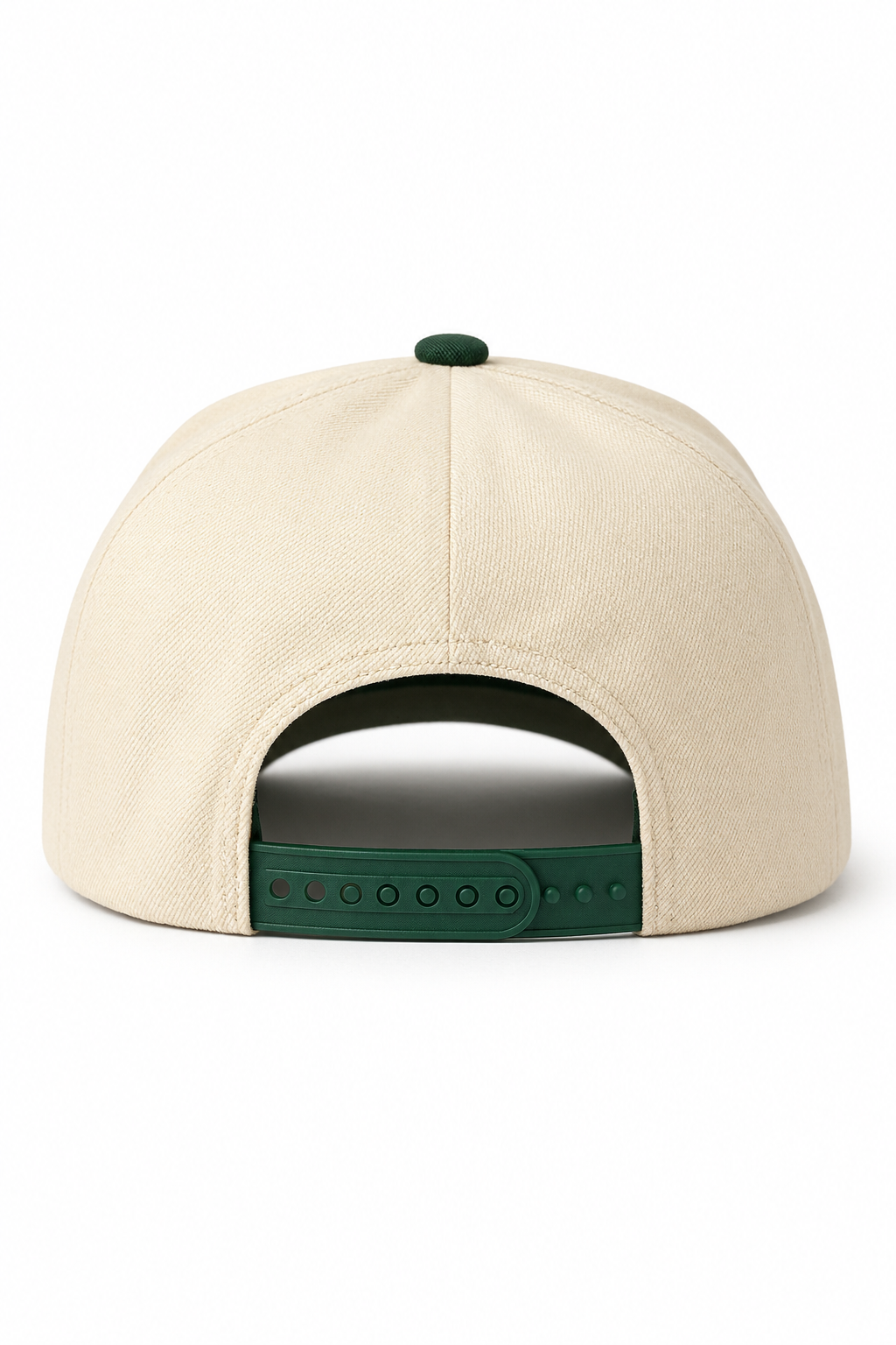 The back of a structured baseball cap in cream canvas with a dark green adjustable strap and button.